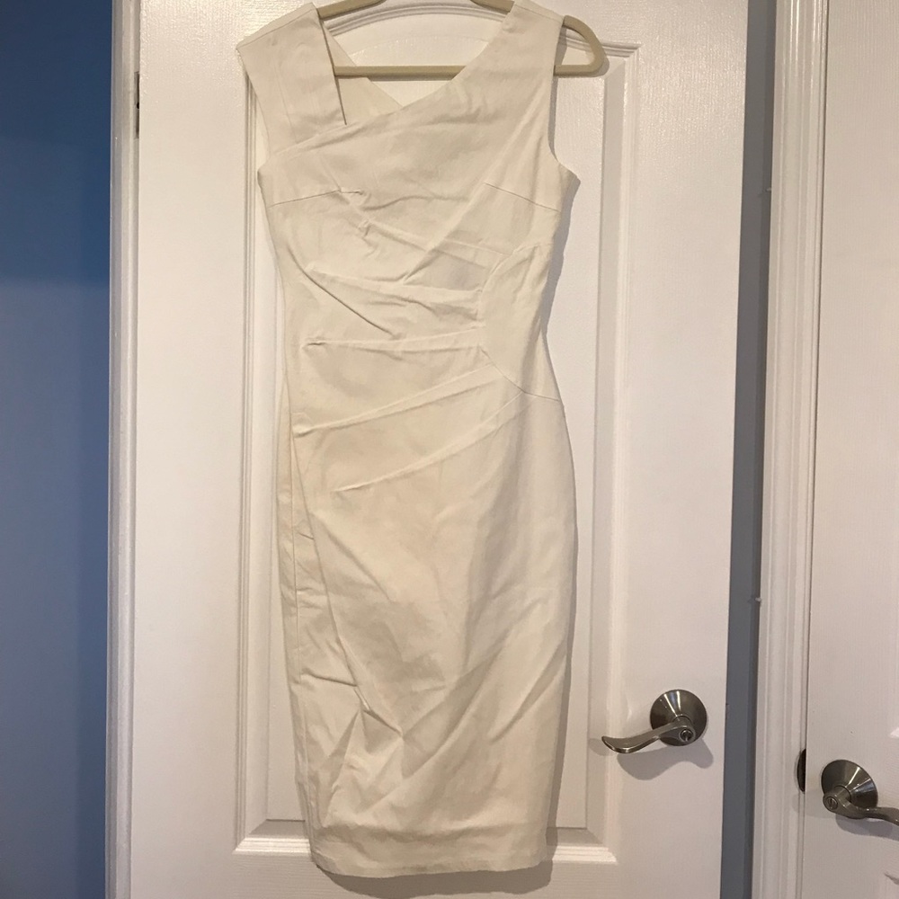 Asymmetrical white midi dress